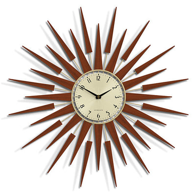 Pluto sunburst style wall clock by Newgate World with dark wood rays and a gold metal Arabic dial